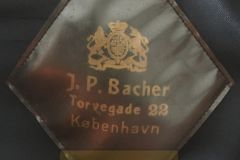 J.P. Bacher.
